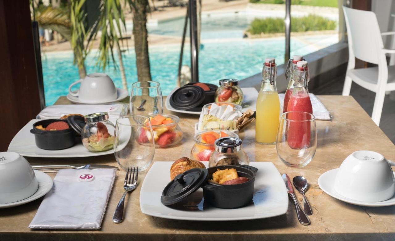 סנטו דומינגו Dominican Fiesta Hotel מראה חיצוני תמונה A breakfast table at a hotel
